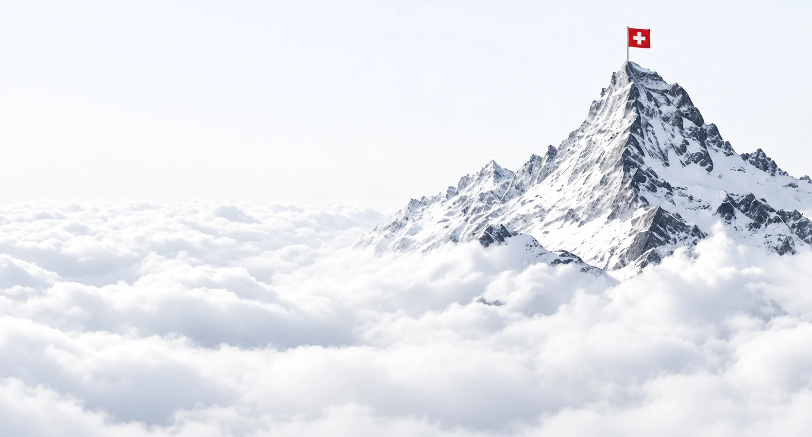 Ein verschneiter Gipfel mit einer Schweizer Fahne, über den Wolken.